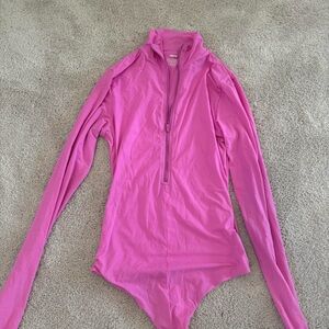 SKIMS pink fits everyone zip up long sleeve bodysuit